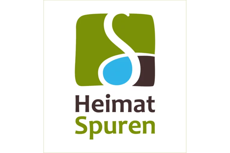Logo der Heimatspuren Wanderwege imj gesundLand Vulkaneifel: weisses S aud grünem Grund